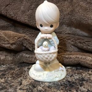 Precious moments porcelain boy with Easter basket